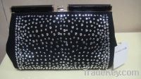 Sell clutch bag surface with Studs and Rivet