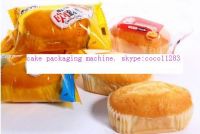 Roll Cake Packaging Machine With Back Side Sealing