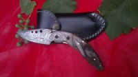 Damascuse Folding knife with Pure Ram Horn