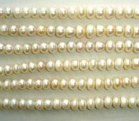 Sell freshwater pearls strands(button shape)