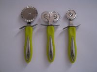 pastry cutter, green plastic handle and two heads cutter