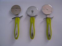 pastry cutter, green plastic handle and two heads cutter