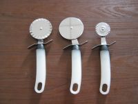 pastry cutter, white plastic handle cutter, two head cutter