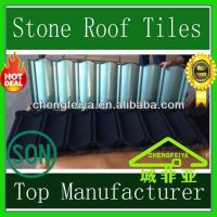 Interlocking design stone coated roofing shingle