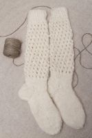 Warm woolen knee socks knitted by hand