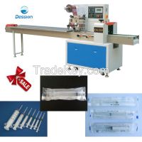 Syringe, squirt, injector packaging machine