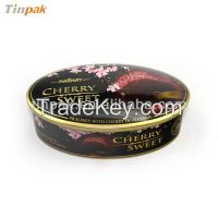 delicate oval shaped chocolate tin box