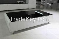 white table with black tempered glass top