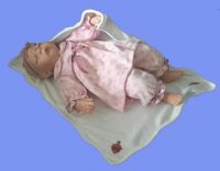 sleeping vinyl baby doll, with stuffed body, in shoe box