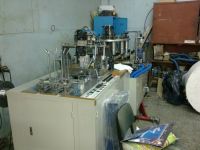 Paper cup making machine and paper cutting machine