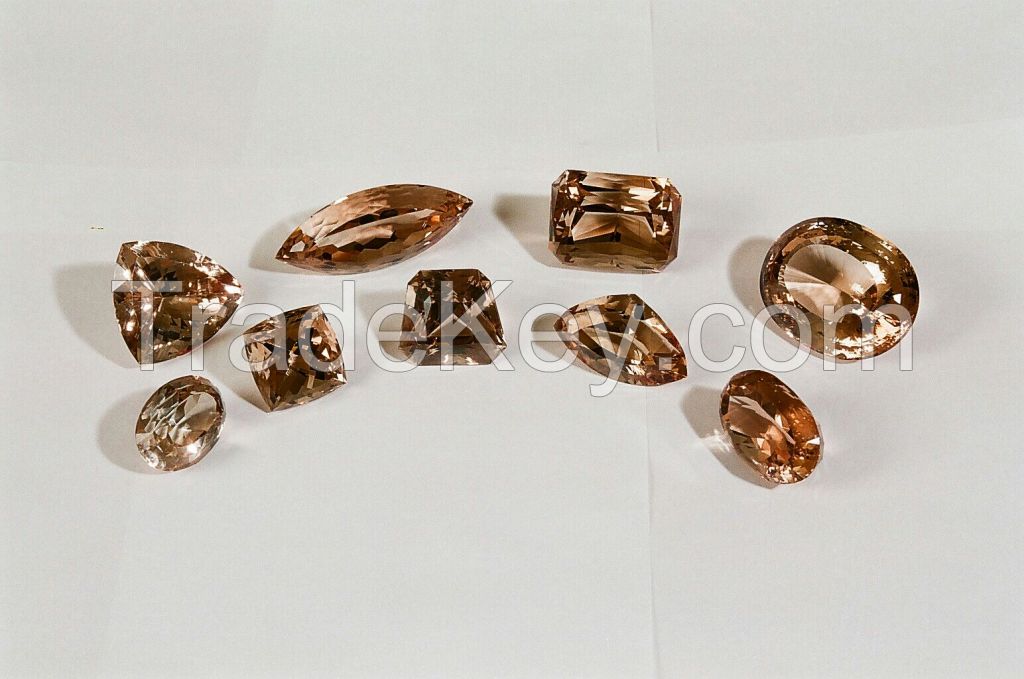 Exclusive 9 Exquisite Natural Brown Topaz stones including the world's largest natural topaz.