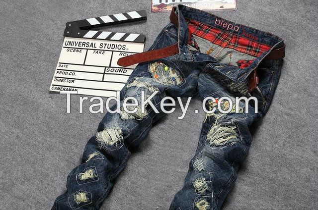 Wholesale Europe and the influx of new men Slim jeans small straight jeans personality hole denim trousers rivets