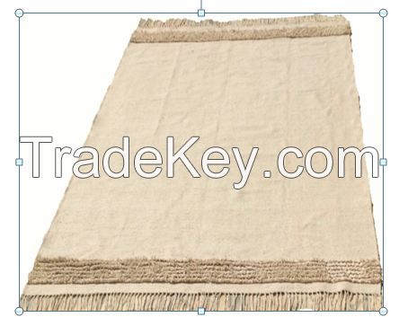 Tissage en coton grÃ¨ge avec deux bandes effilloches