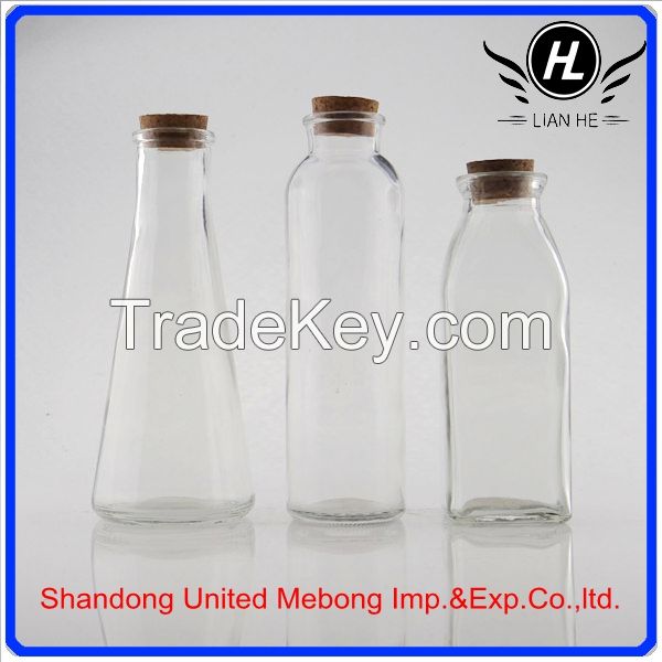 Clear glass beverage bottles/glass bottles for water with plastic cap for round shape