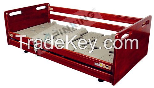 electrical bed with vertical lift movement and lockable rails