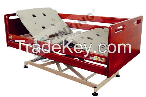 electrical bed with vertical lift movement and lockable rails