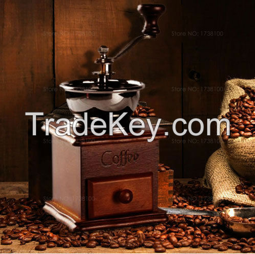 Vintage machine hand grinding coffee beans