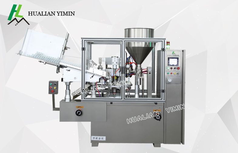 Automatic tube filling and sealing machine