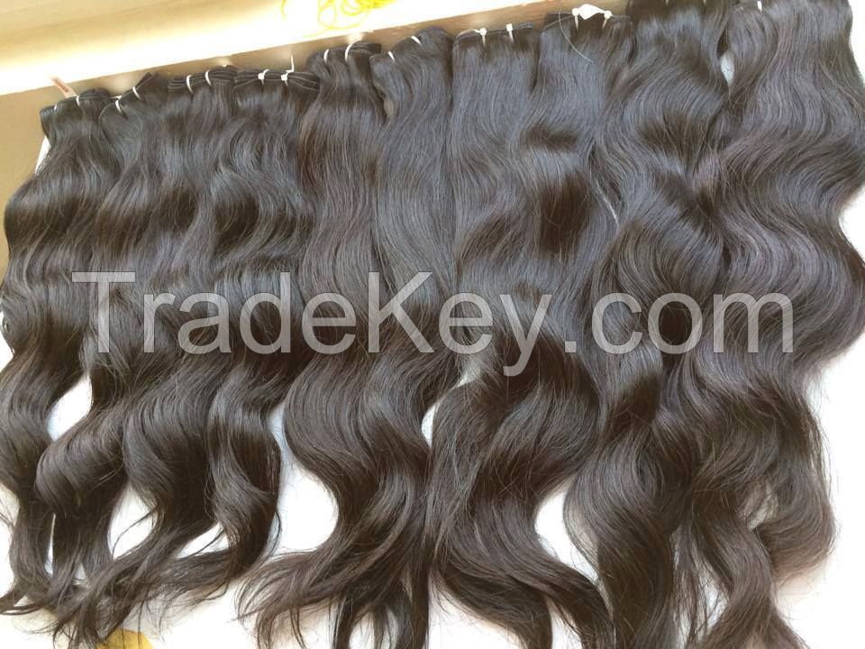 Vietnamese best wholesale price for 100% natural wavy/curly weft hair 10- 30 inches with highest quality