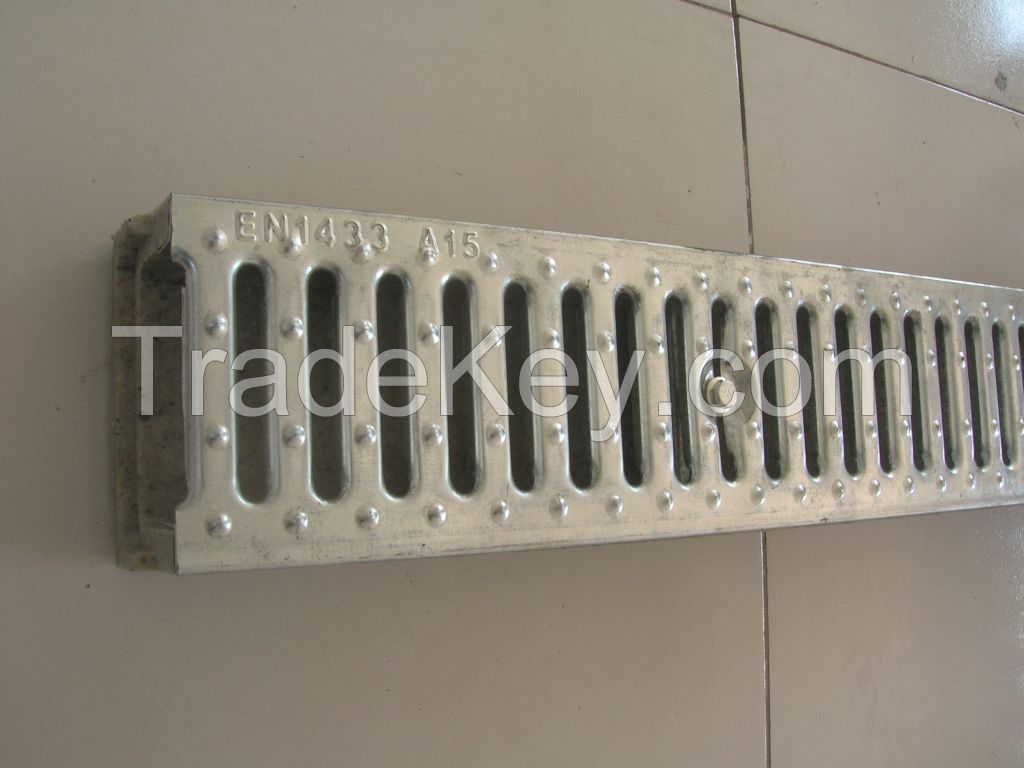 Polymer drainage channel/linear surface drains with stainless steel grating