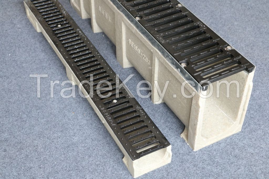 Polymer concrete channel with casting iron grating