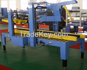 Folding carton sealing machine