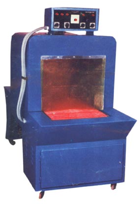 Shrink wrapping machine