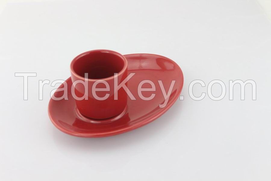 Handleless Red Cup With An Oval Saucer