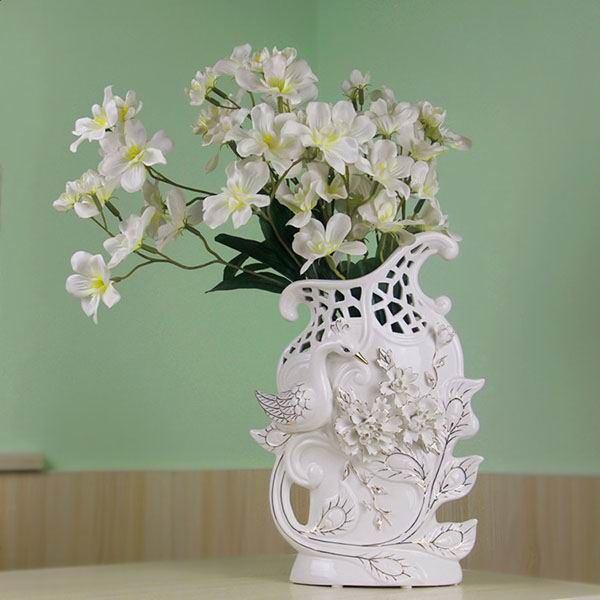 Embossed Peacock White Porcelain Vase