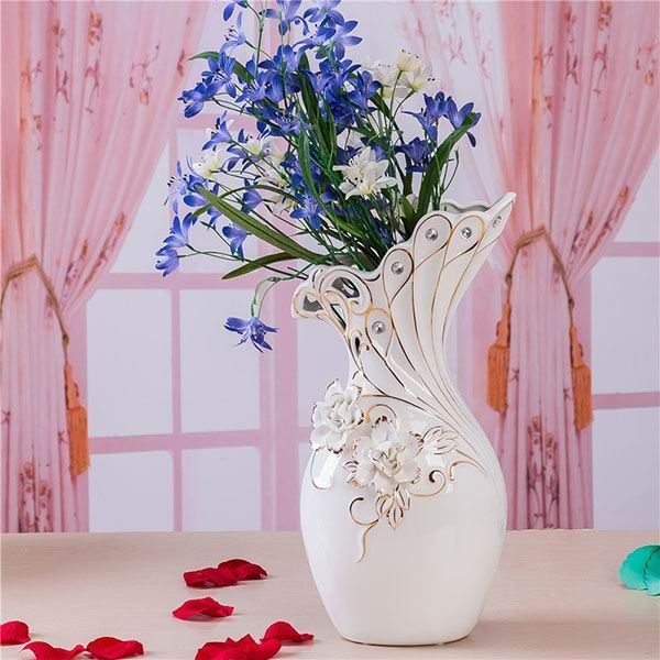 Embossed Rose Flower Hollow Carved White Porcelain Vase