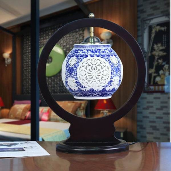 Lantern Shaped Hollow Carved Porcelain Lamp With Wooden Frame