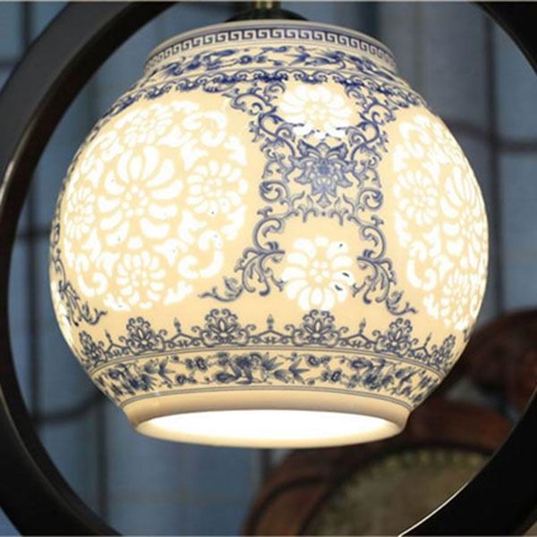 Lantern Shaped Hollow Carved Porcelain Lamp With Wooden Frame