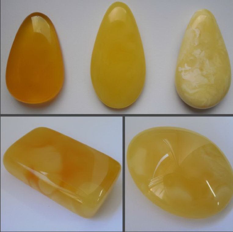 AMBER PENDANTS CUT FROM ONE STONE