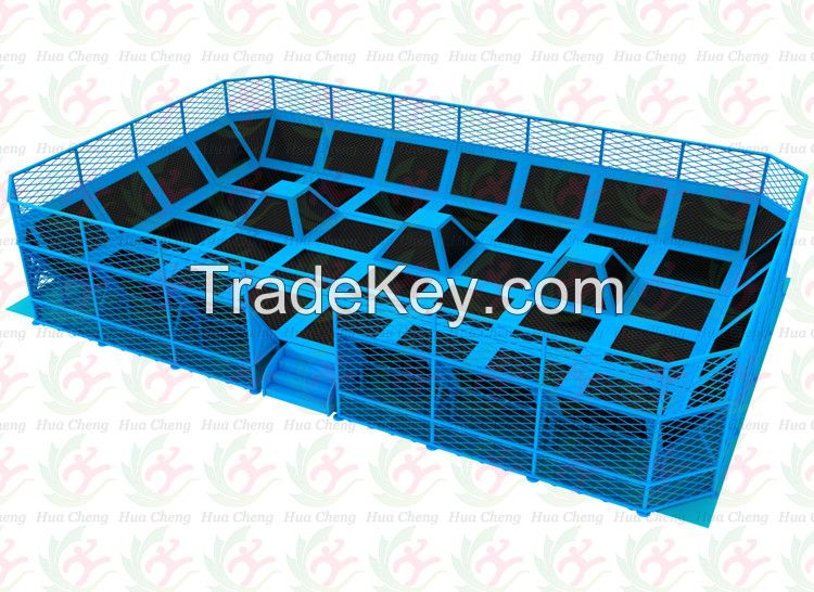 small trampoline park with blue color trampoline amusement park