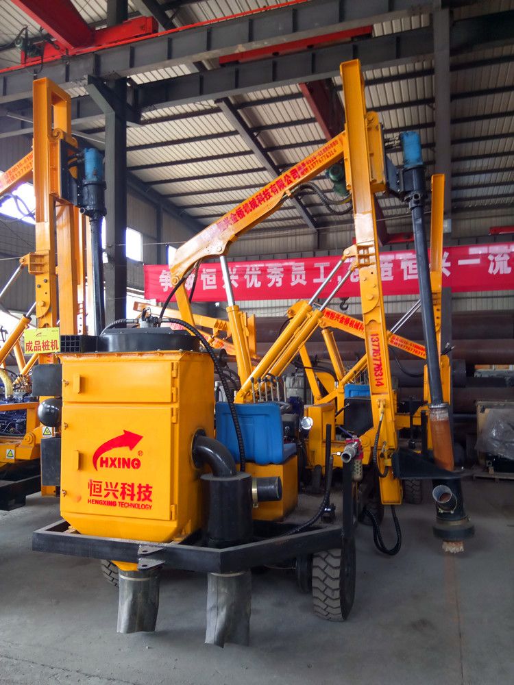 Rock drilling machine pile driver with dust remover for hard construction site