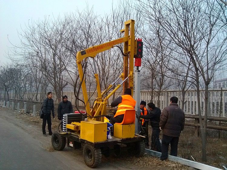 Multiple functional guardrail install drilling small holes hydraulic pile driver