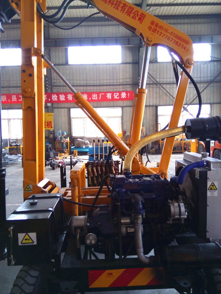 Rock drilling machine pile driver for hard construction site