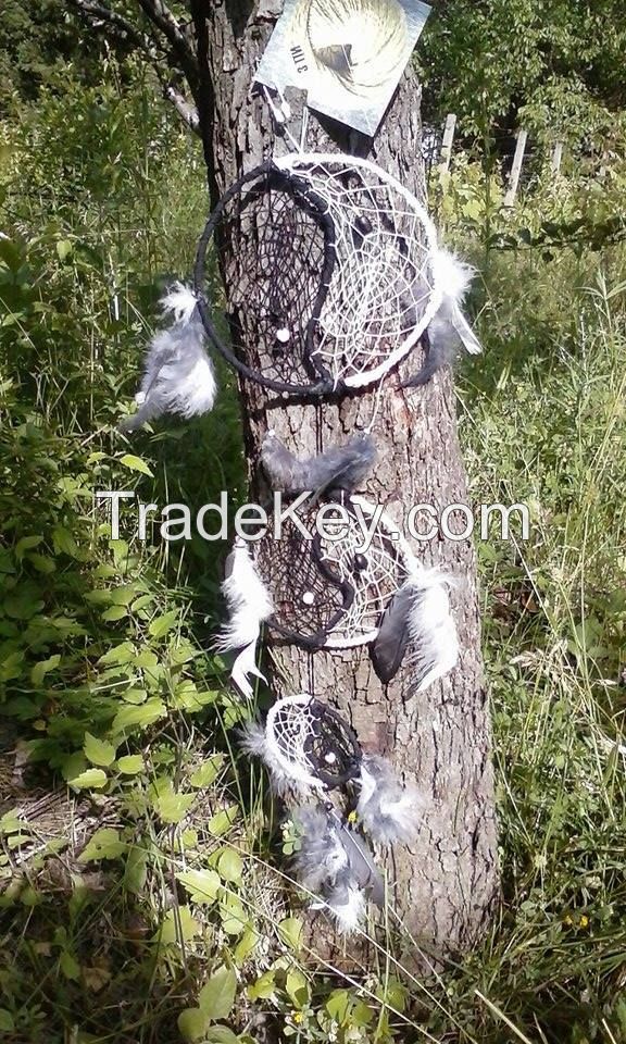 handmade ying yang dream catcher with natural feathers 