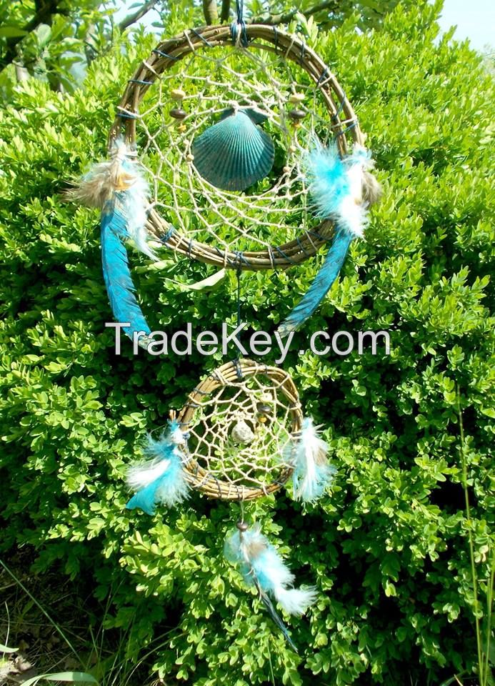 Handmade different models of dream catchers with shells, natural , peacock and art feathers