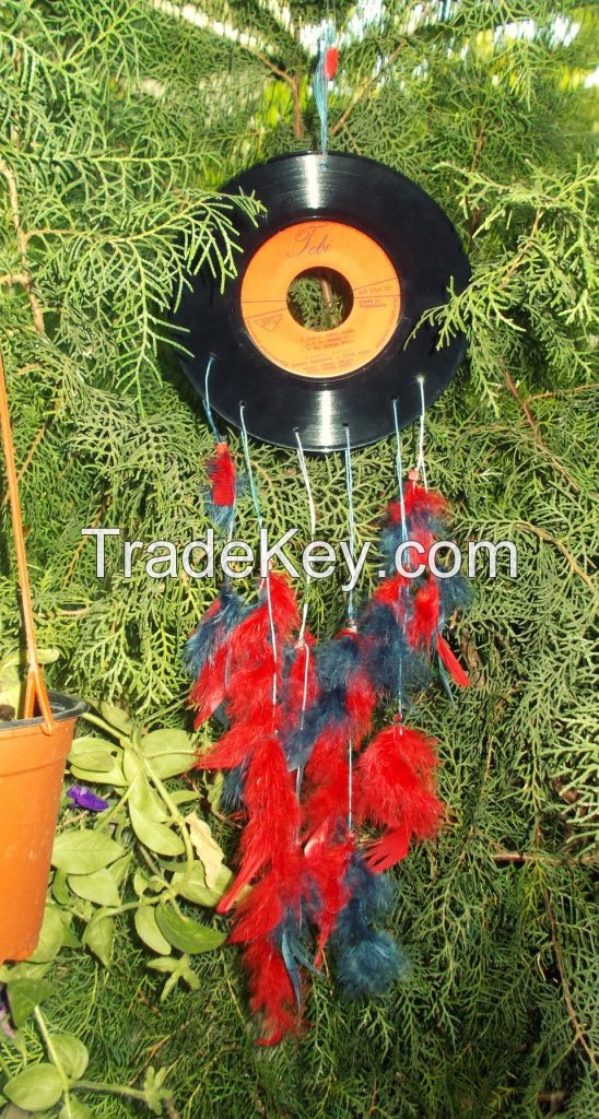 handmade dream catchers on music disks with natural featahers 