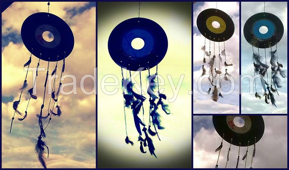 handmade dream catchers on music disks with natural featahers 