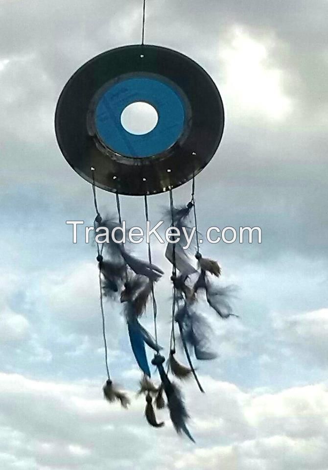 handmade dream catchers on music disks with natural featahers