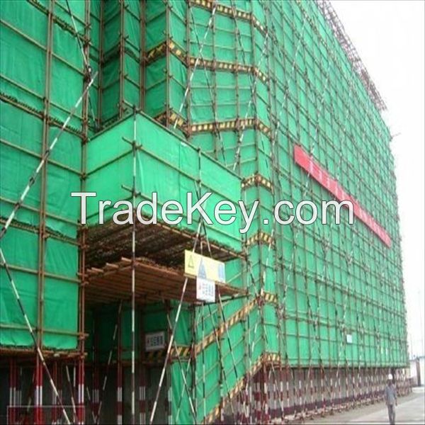 Construction Safety Net Scaffold Net debris control netting, used to enclose scaffolding around a vertical building tower structure