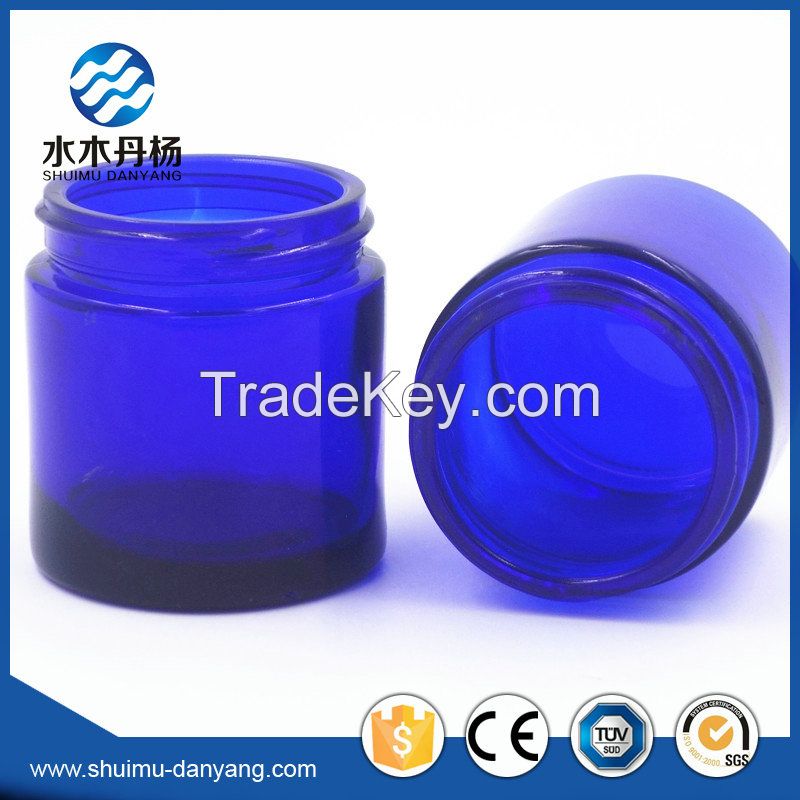 Hot sale 100ml round amber/blue cosmetic glass jar