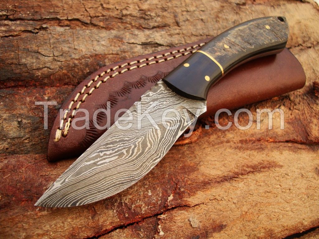 Custome made damascus steel skiner knife with leather sheath by R.T. Industry