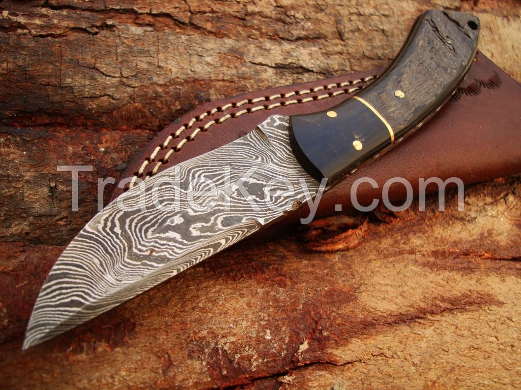 Custome made damascus steel skiner knife with leather sheath by R.T. Industry