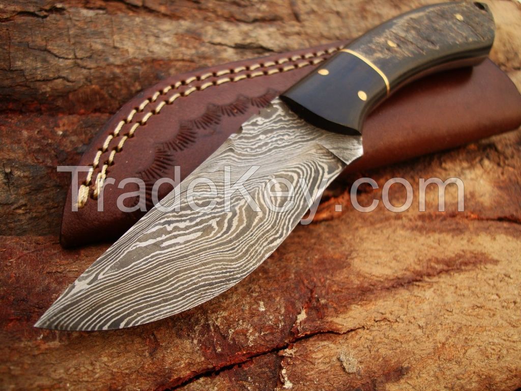 Custome made damascus steel skiner knife with leather sheath by R.T. Industry