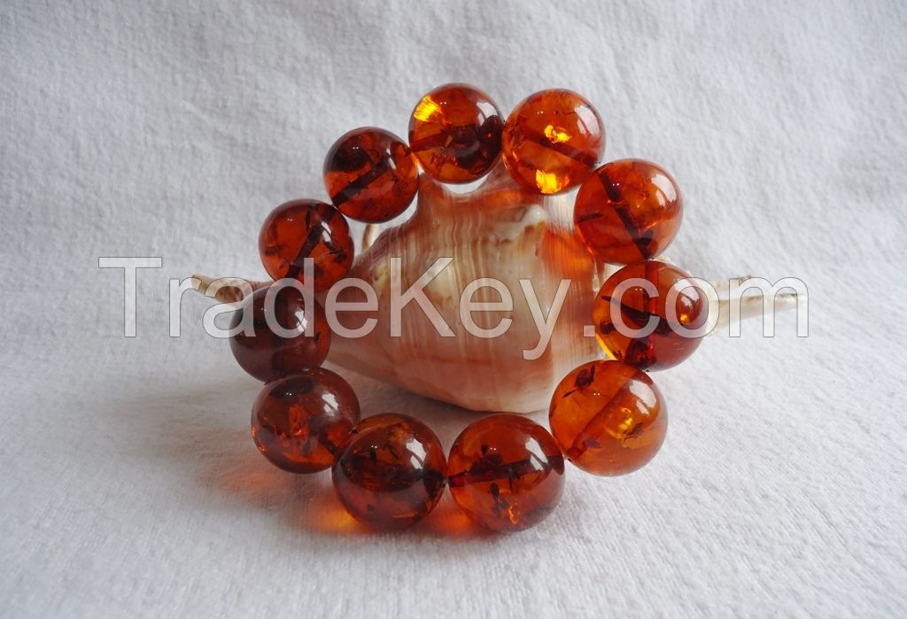 Amber bracelet, color is "tea with sparkle bubbles inside"