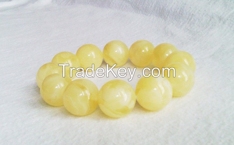 Amber bracelets, white color