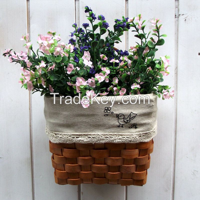 Wall hanging basket fill with decoration